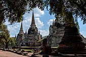 Ayutthaya, Thailand. Wat Phra Si Sanphet, the three main chedi with in the foreground the ruins of what remains of the surrounding gallery.